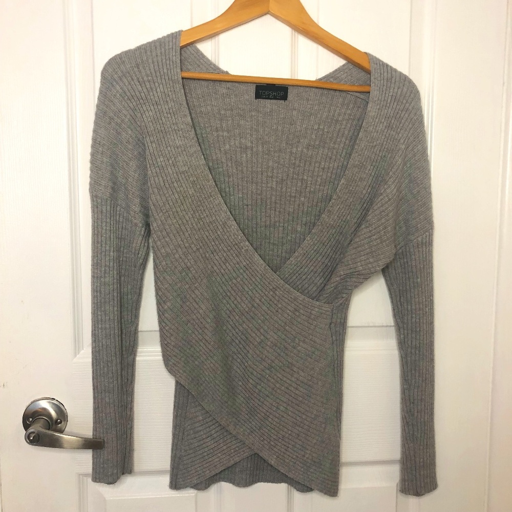 Wrap around sweater with deep V neck swoop